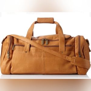 David King leather duffel bag with handles and a shoulder strap